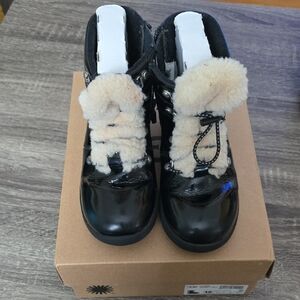 UGG Black Boots with Cream Accents